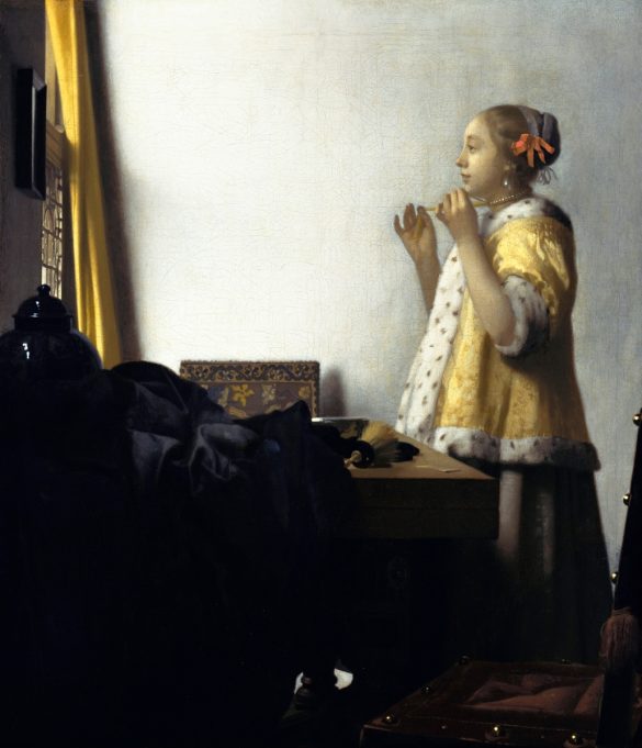 Młoda kobieta z naszyjnikiem z pereł (ok. 1663–1665) autorstwa Johannesa Vermeera